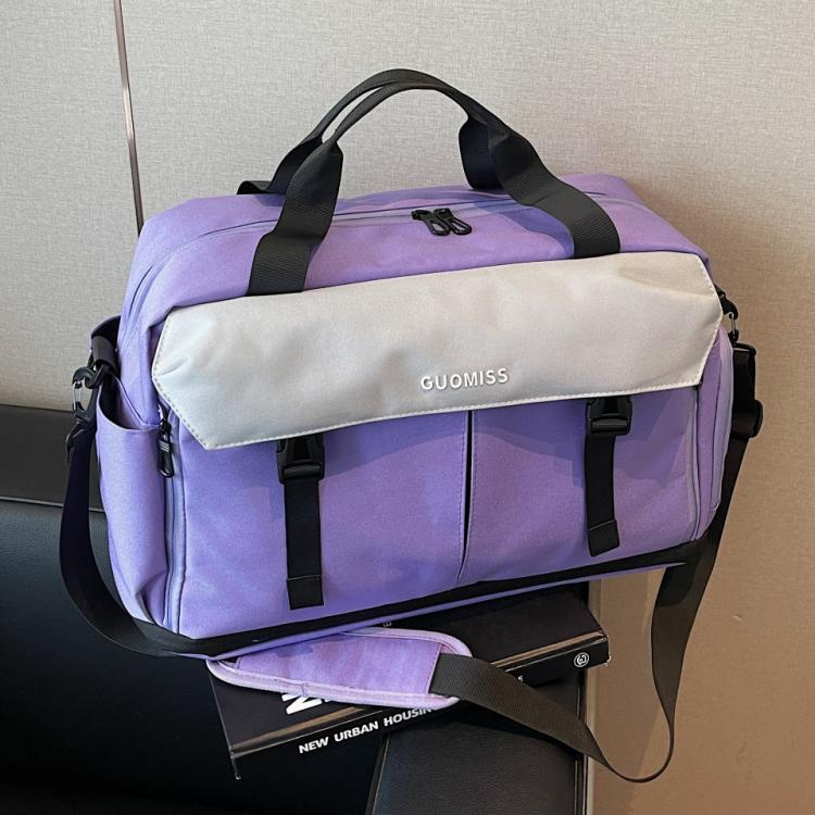 Purple and cream travel duffel bag with black handles and side zipper