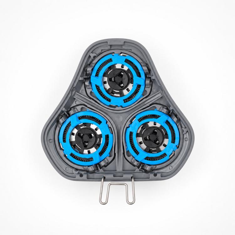 Rotary shaver head interior with three blue-ring cutters and gray frame