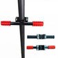 Red rubber handlebar grips on black crossbar with mounting brackets