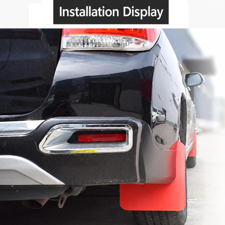 Installed red rear mud flap splash guard on car bumper