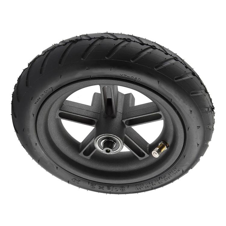 Pneumatic scooter rear wheel with black tire, hub center, and metal valve stem