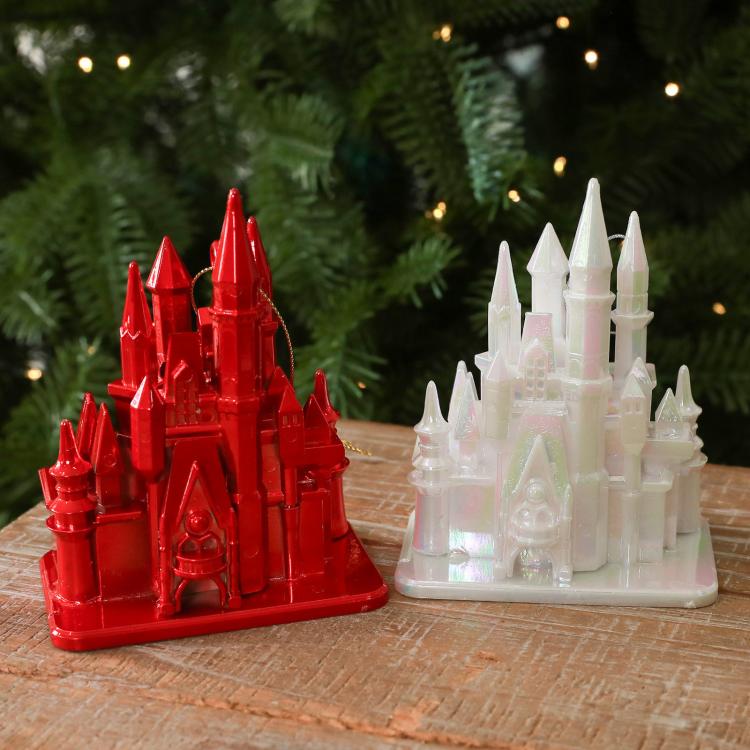 Red and white acrylic castle ornaments, 3D fairytale building style, on wooden surface