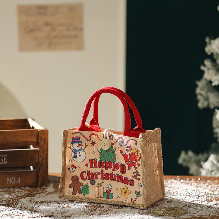 Jute Christmas tote bag with red handles and festive “Happy Christmas” front print