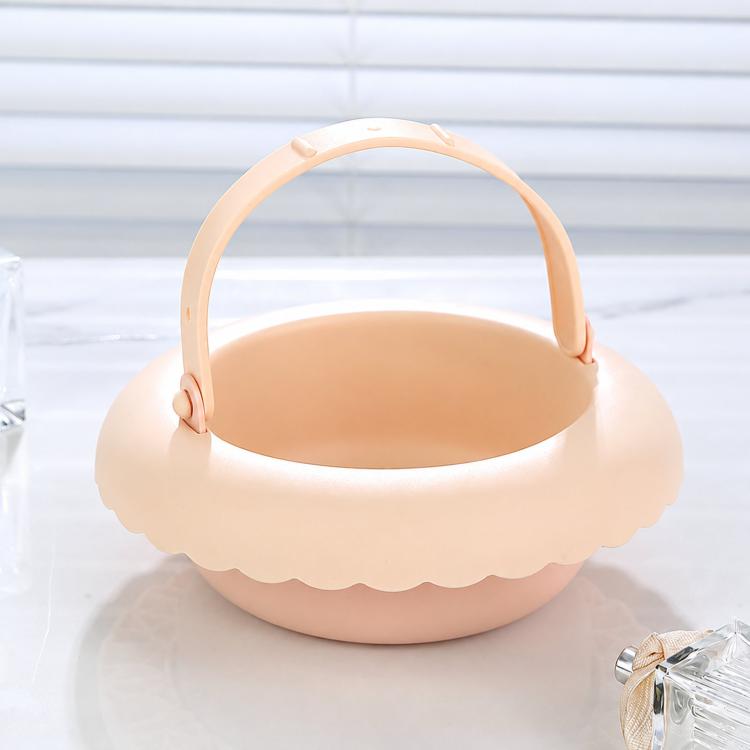 Beige silicone makeup brush cleaning bowl with handle and drain mat base
