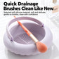 Purple silicone brush cleaning bowl with textured drain mat and makeup brush