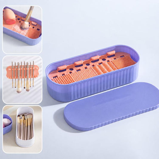 Purple makeup brush cleaning box with orange textured insert, drying rack, open lid