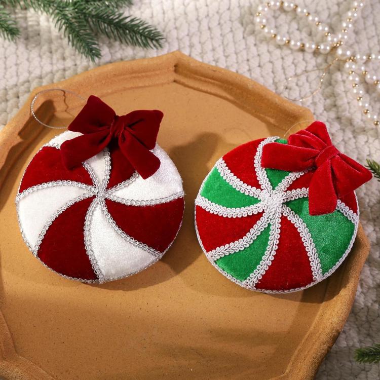 Pair of plush hanging Christmas ornament balls, red/white and red/green with bows