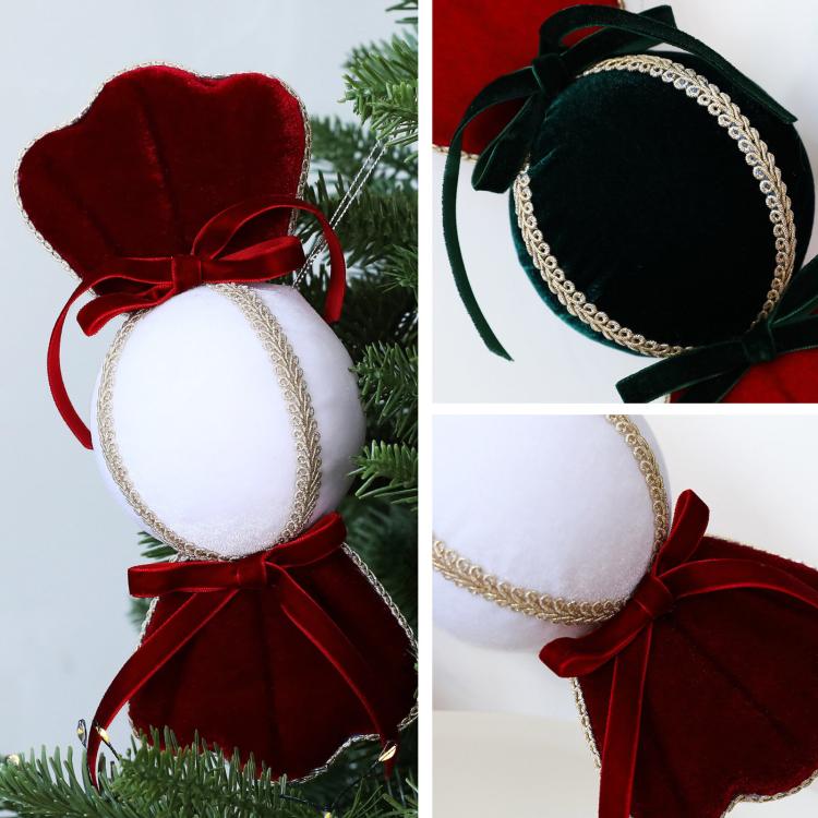 Velvet candy ornaments close-up: red and dark green/black with white centers and gold trim