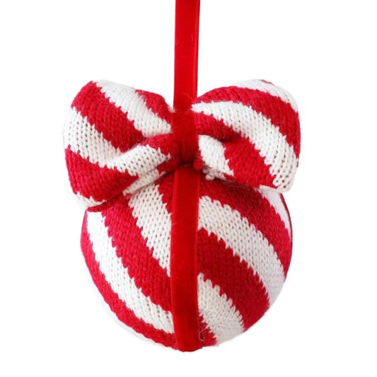 Red and white striped knitted bow ornament with hanging red cord