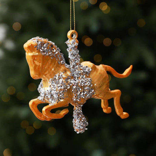 Gold rocking horse ornament with silver glitter and hanging loop