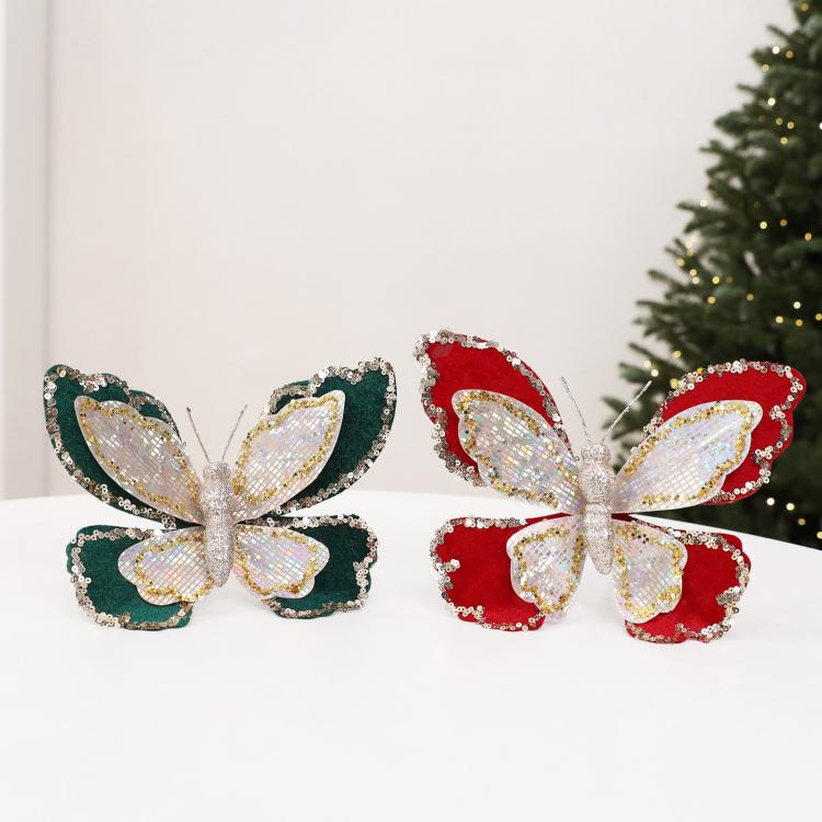 Double-layer sequin butterfly ornaments, one dark green and one red, each with glitter loop