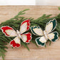 Set of 2 double-layer sequin butterfly ornaments, one dark green and one red, gold trim