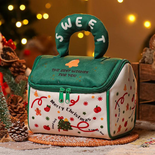 Green zippered Christmas treat tote with plush handle and holiday graphic front