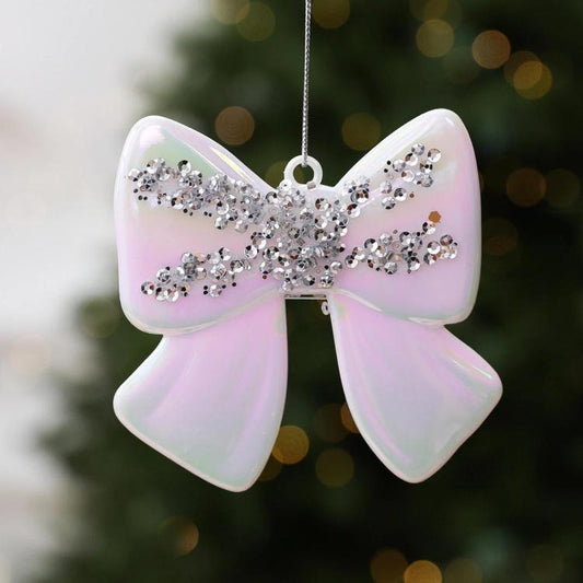 White opal bow hanging ornament with silver sequined center stripe and loop