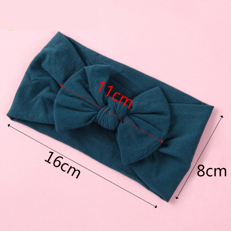 Infant hair bow headband with dark teal fabric band and large knot bow