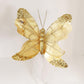 Gold glitter butterfly ornament with detailed sequin wings and hanging loop