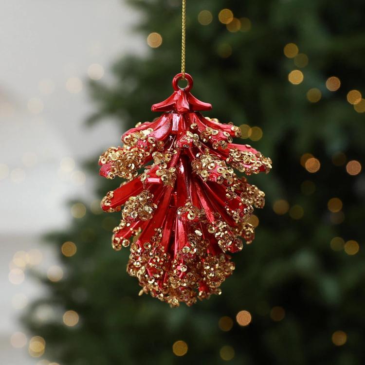 Red-and-gold pinecone-style Christmas tree ornament with hanging loop