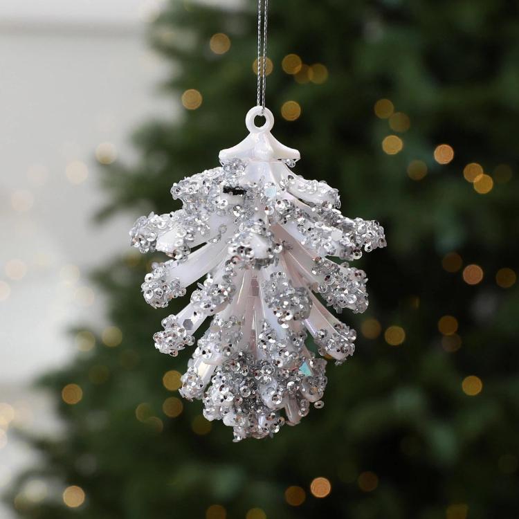 White pinecone-style Christmas tree ornament with glittery petal-like details