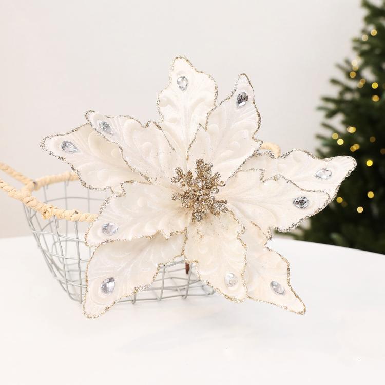 White velvet poinsettia ornament with rhinestone accents and hanging loop