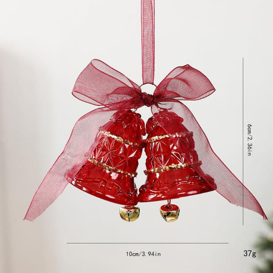 Red double-bell hanging ornament with gold glitter and bow ribbon details, acrylic