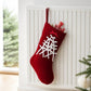 Large velvet Christmas stocking, red with white snowflake-like lacing and hanging loop