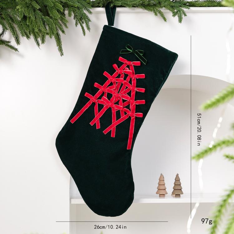 Large dark green velvet Christmas stocking with red lattice and wide bow, 26cm long