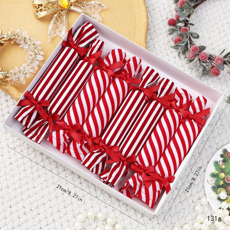 Red-and-white striped plush candy ornament set in a gift box, tied with bows