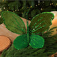 Dark green velvet butterfly Christmas tree ornament with glittery beaded trim