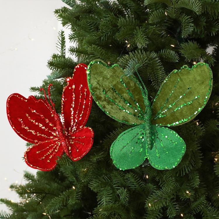 Velvet butterfly ornaments on a tree: red and dark green with beaded glitter trim