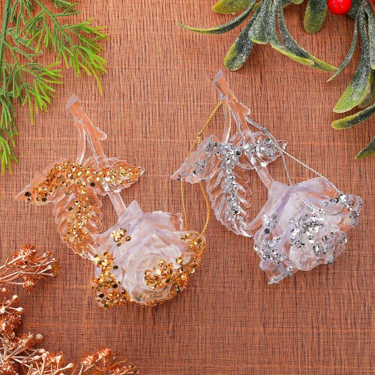 Acrylic rose Christmas ornaments in white and gold with glitter beaded accents and loops