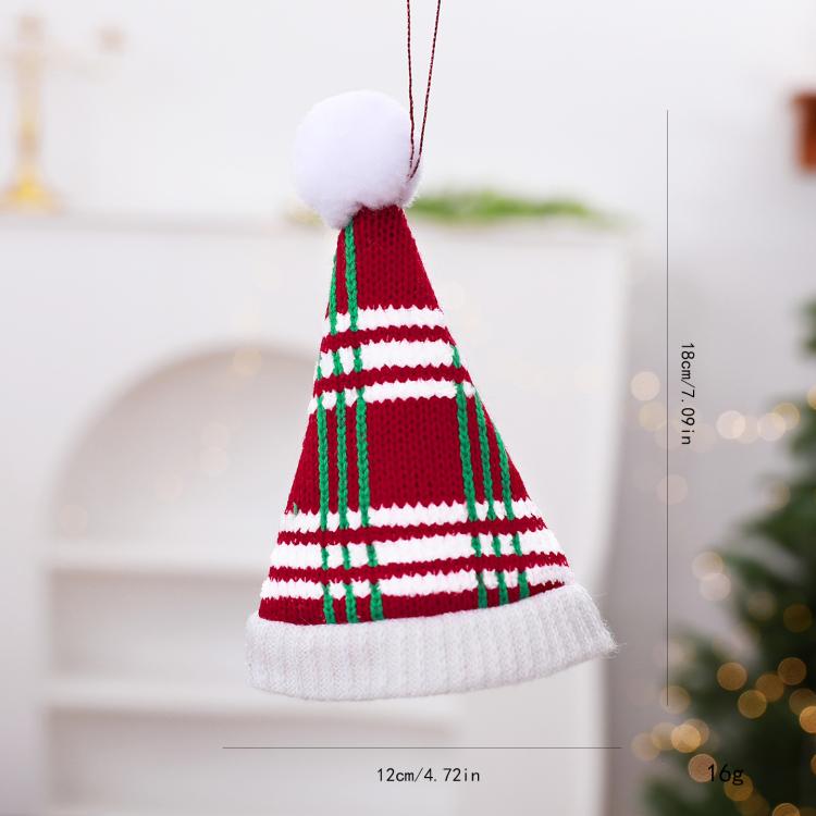 Mini knitted sweater ornament with red and green striped design, white cuffs, hanging loop.