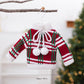 Mini knitted sweater ornament with red, green, and white stripes and pom pom accents.