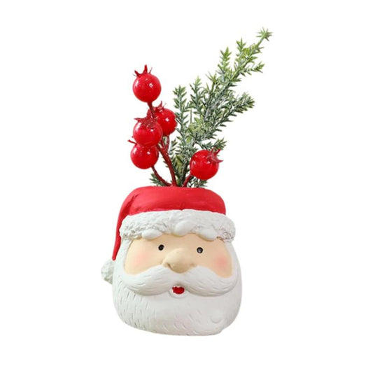 Christmas gnome ornament of a Santa face with red hat, white beard, red berry stem