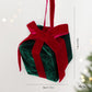 Red and dark green velvet plush gift box ornament with red ribbon bow and hanging loop