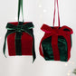 Pair of hanging velvet gift box ornaments with green and red ribbon bows