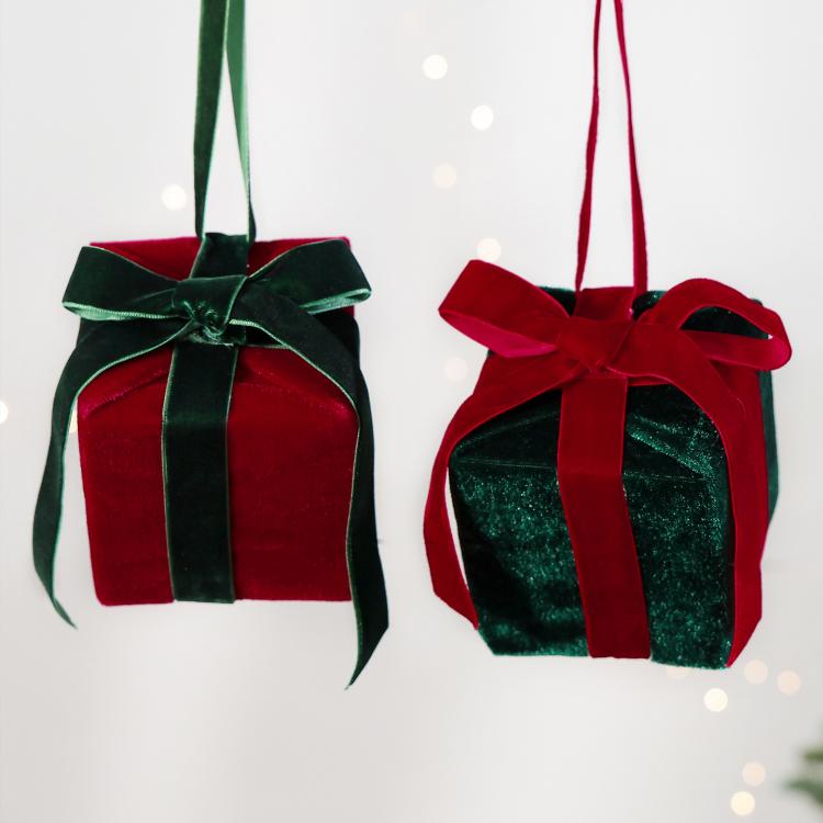 Pair of hanging velvet gift box ornaments with green and red ribbon bows