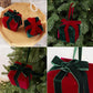 Velvet gift box ornaments in red and dark green with matching ribbon bows and loops