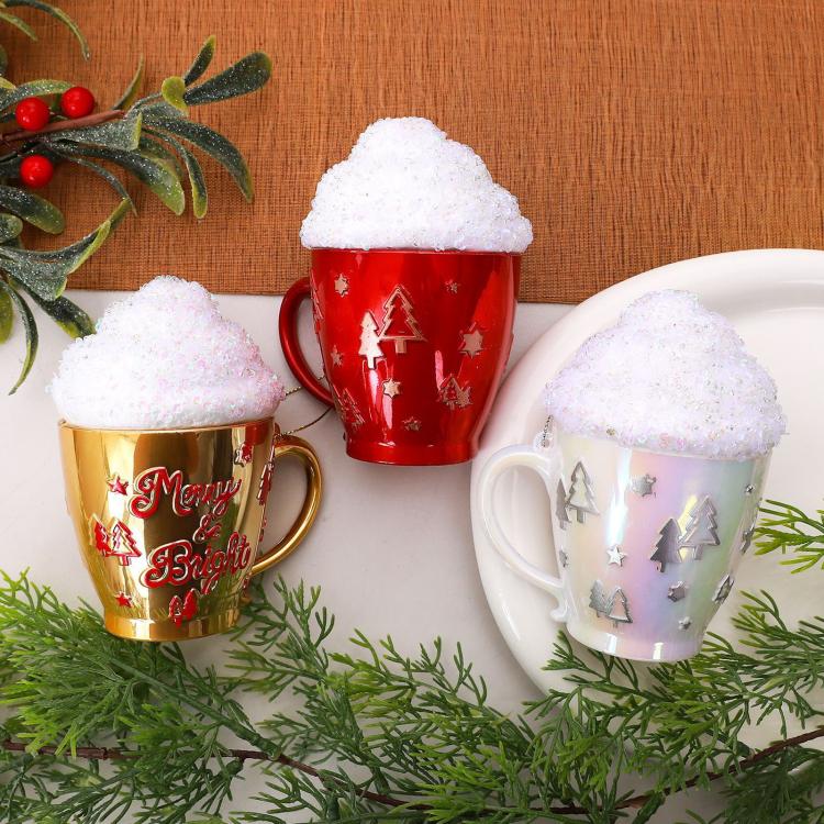 Set of three cup-shaped Christmas ornaments: gold, red, and white with glittered caps