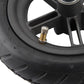 Rear wheel hub detail with valve stem and brake disc rotor