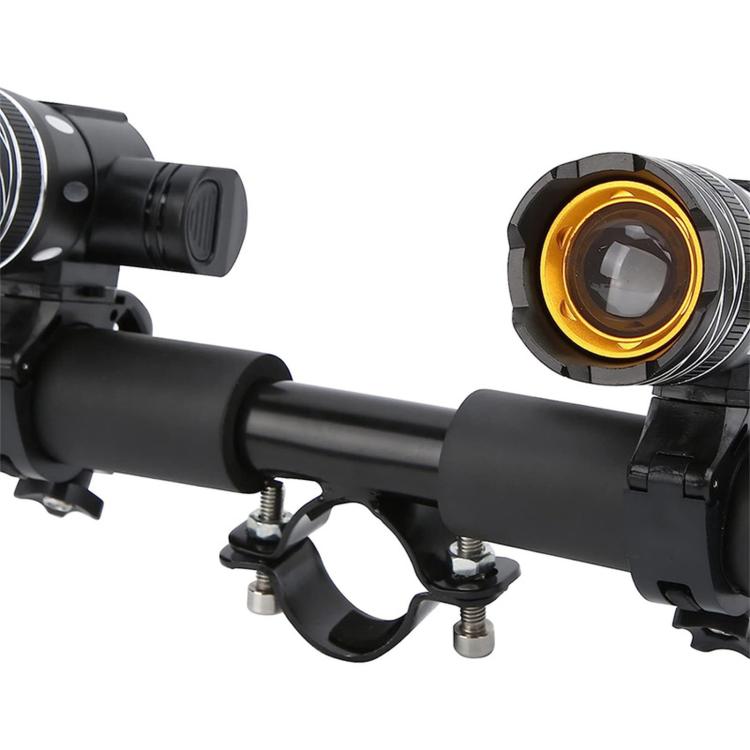 Electric scooter lamp mount close-up with black handlebar bar and amber front lens
