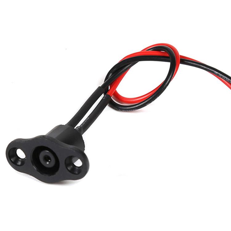 Charging port connector with black housing and red wire loop