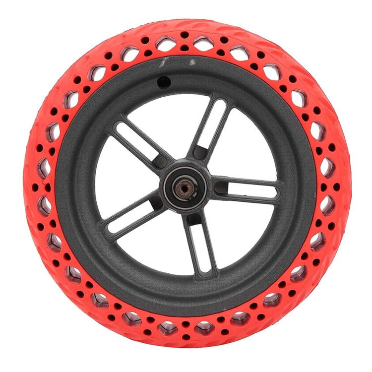 Red solid honeycomb tire and dark wheel rim with center hub, Xiaomi M365 Pro rear