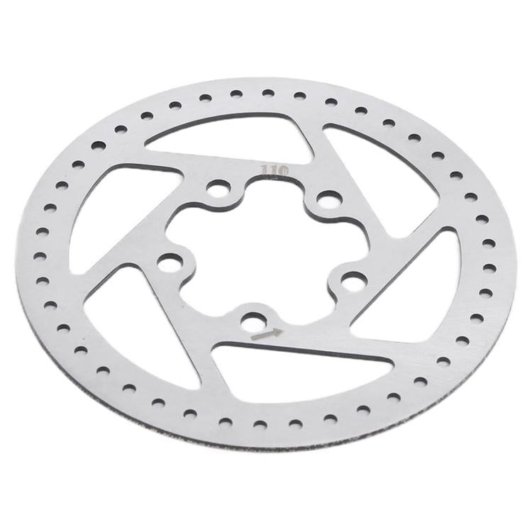 Silver disc brake rotor close-up of cutouts and bolt holes