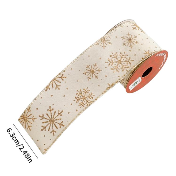 Champagne white Christmas ribbon with gold snowflake and star patterns, roll