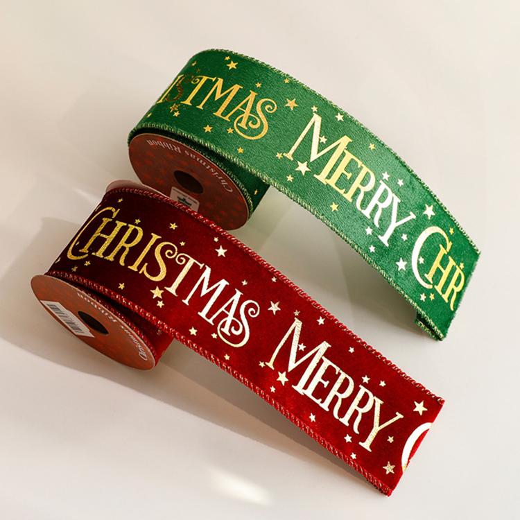 Christmas ribbon rolls: green “T M A S MERRY” and red “MERRY CHRISTMAS” with stars