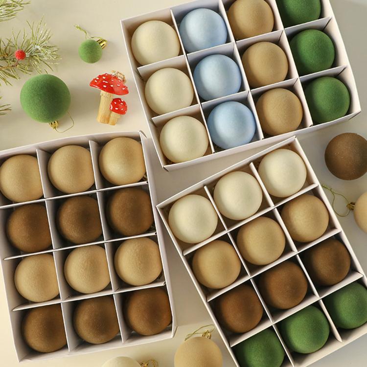 Flocked Christmas ball ornaments with hanging loops in assorted coffee brown, white, green, and light blue