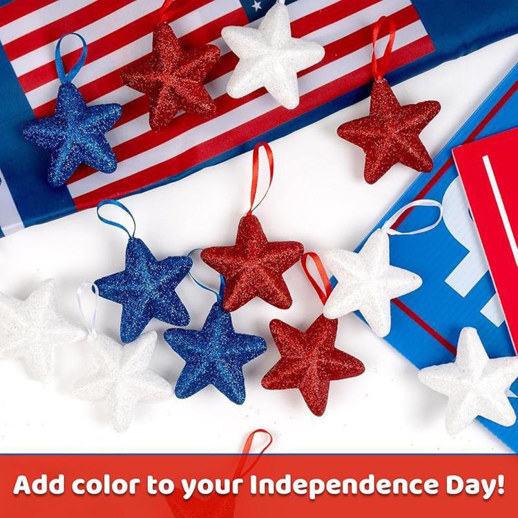 Glitter five-pointed star ornaments in red, white, and blue with red hanging loops