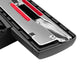 Vacuum floor brush head close-up: metal plate with red brush strips and black bristles.
