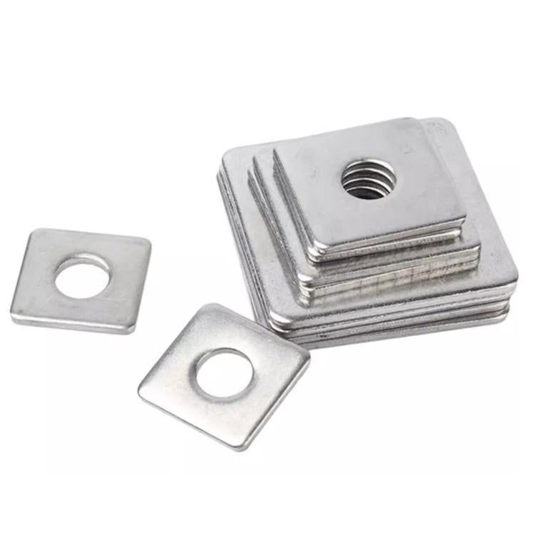 Stainless steel square flat washers with center holes, stacked and separate pieces