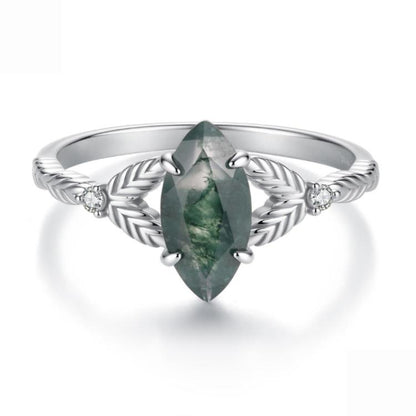 Sterling silver leaf-pattern ring with green marquise agate center and side clear stones
